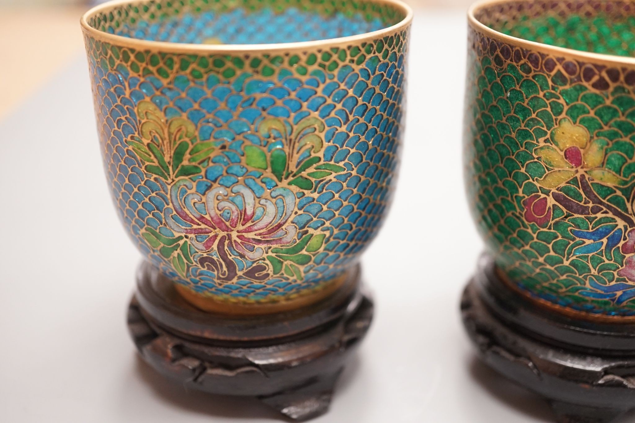 A pair of Chinese plique-a-jour cups (cased)